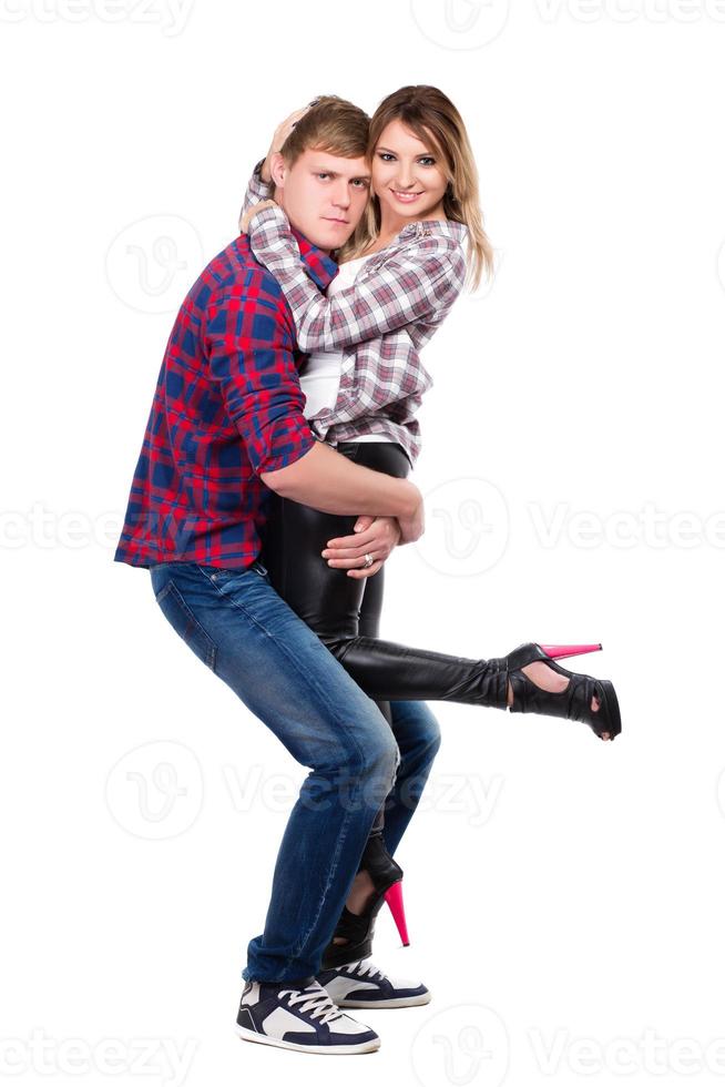 Cheerful pair posing in casual clothes photo