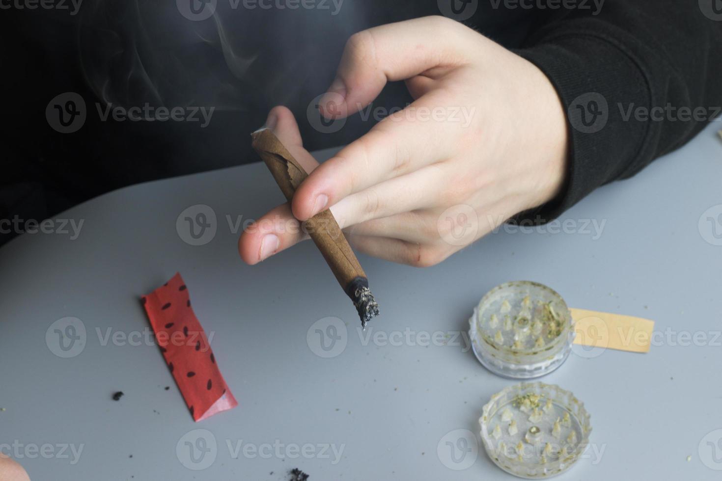 Blunt smoking. Cannabis medical and recreational use. Legal weed photo