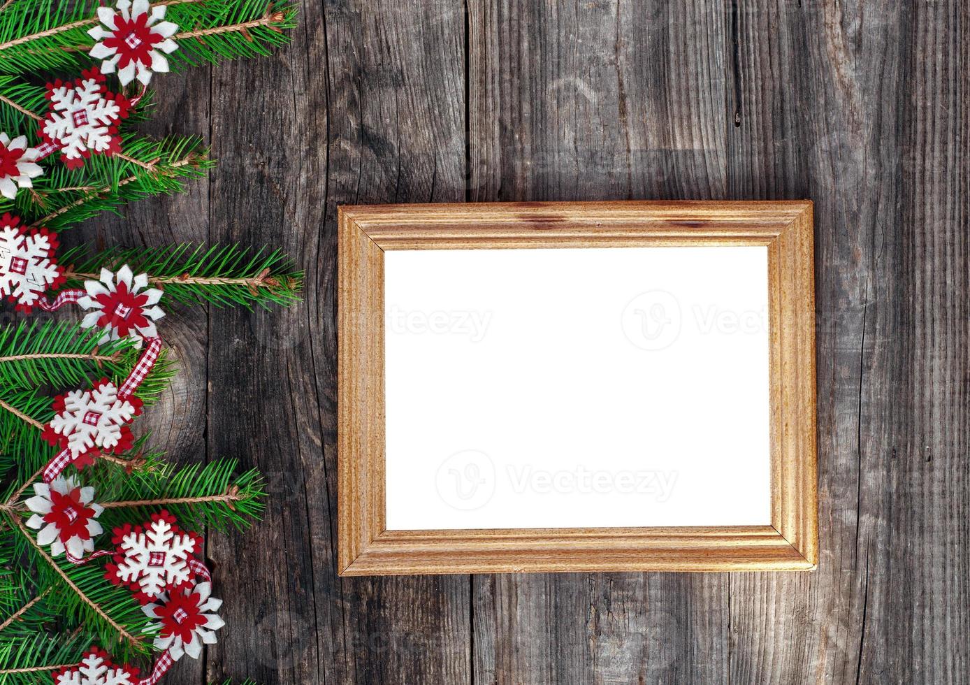 Empty wooden frame on the gray old surface photo