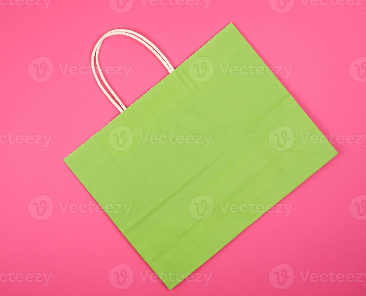empty green paper shopping bag with a handle photo