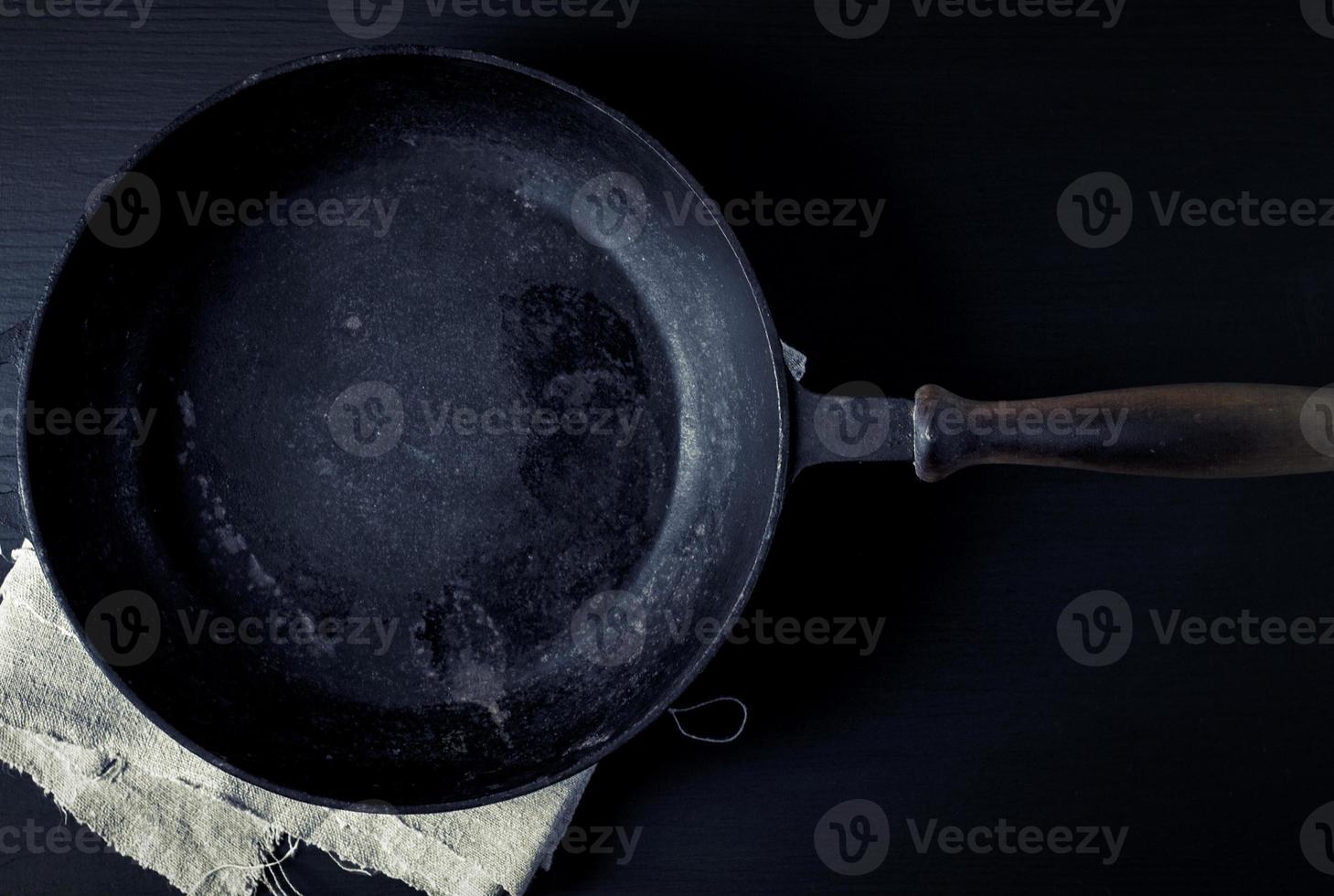 Black cast-iron frying pan photo