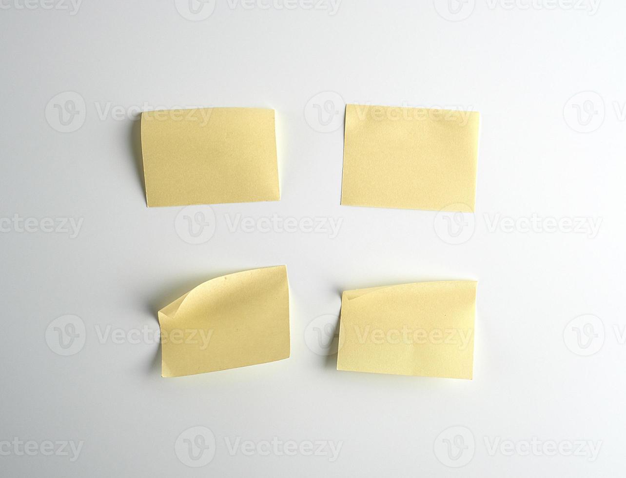 yellow paper stickers on white background photo