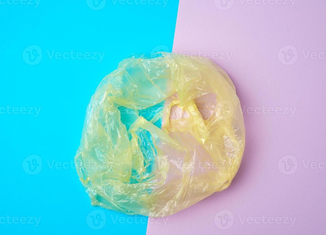open empty plastic bag for products on a colored background photo