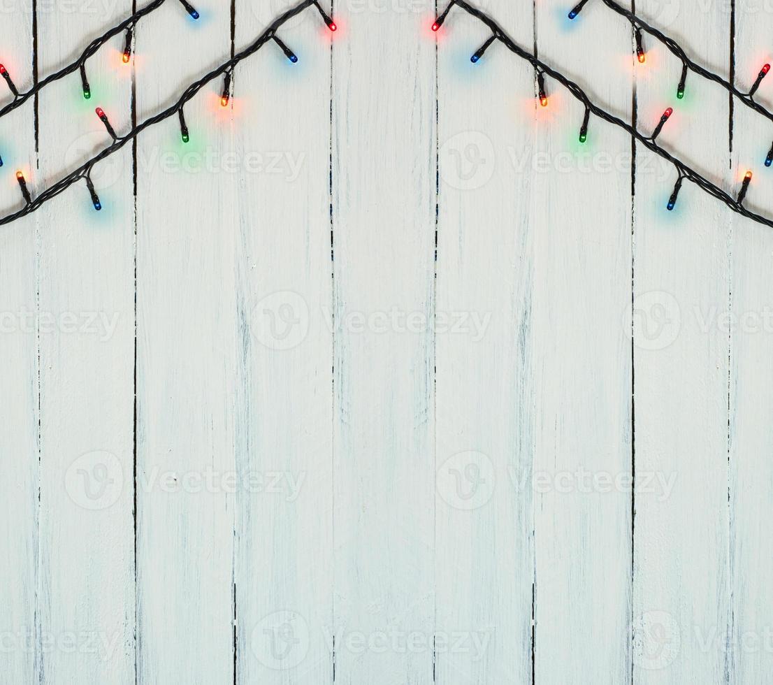 Electric Christmas garland with colored small bulbs photo