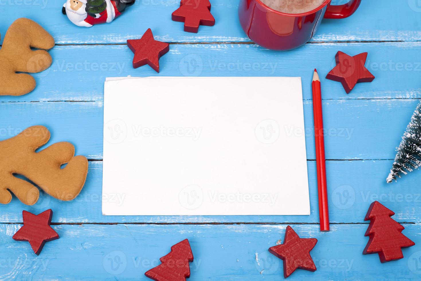 empty paper postcard and a red wooden pencil photo