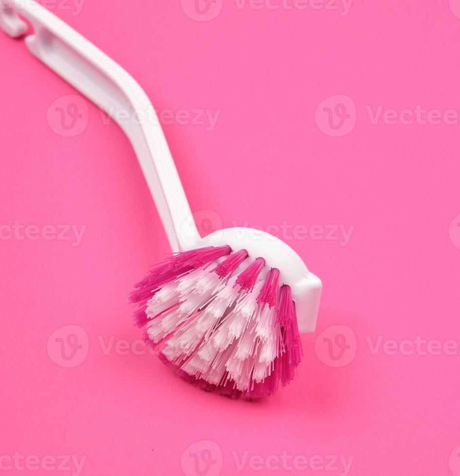 kitchen brush with white plastic handle photo