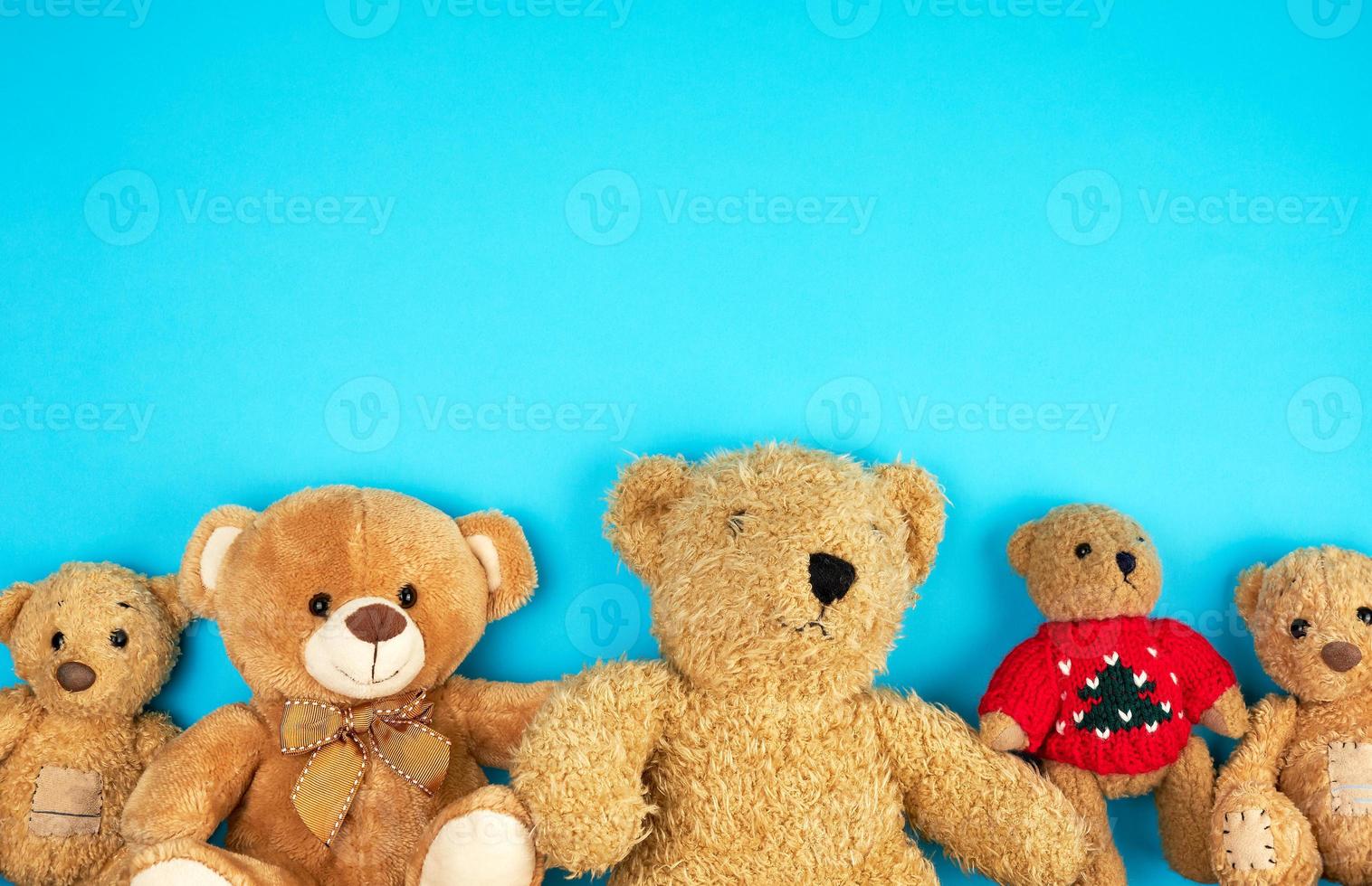 teddy bears on a blue background, friendship concept, photo