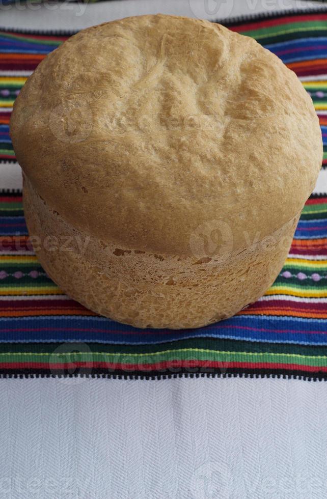 Homemade bread on the tablecloth photo