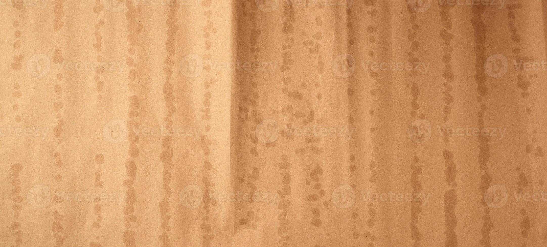 texture of brown kraft paper with bold spots, full frame photo