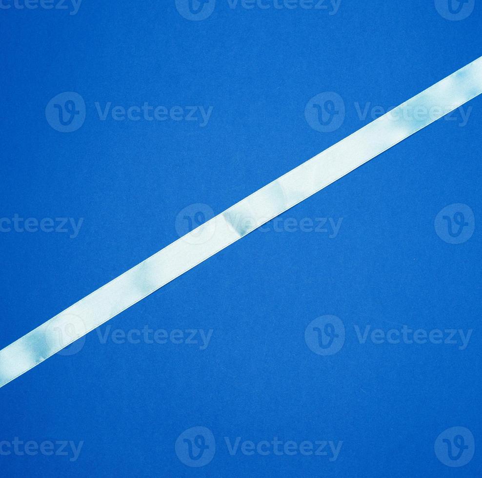 light blue ribbon on a dark blue background 18954131 Stock Photo at