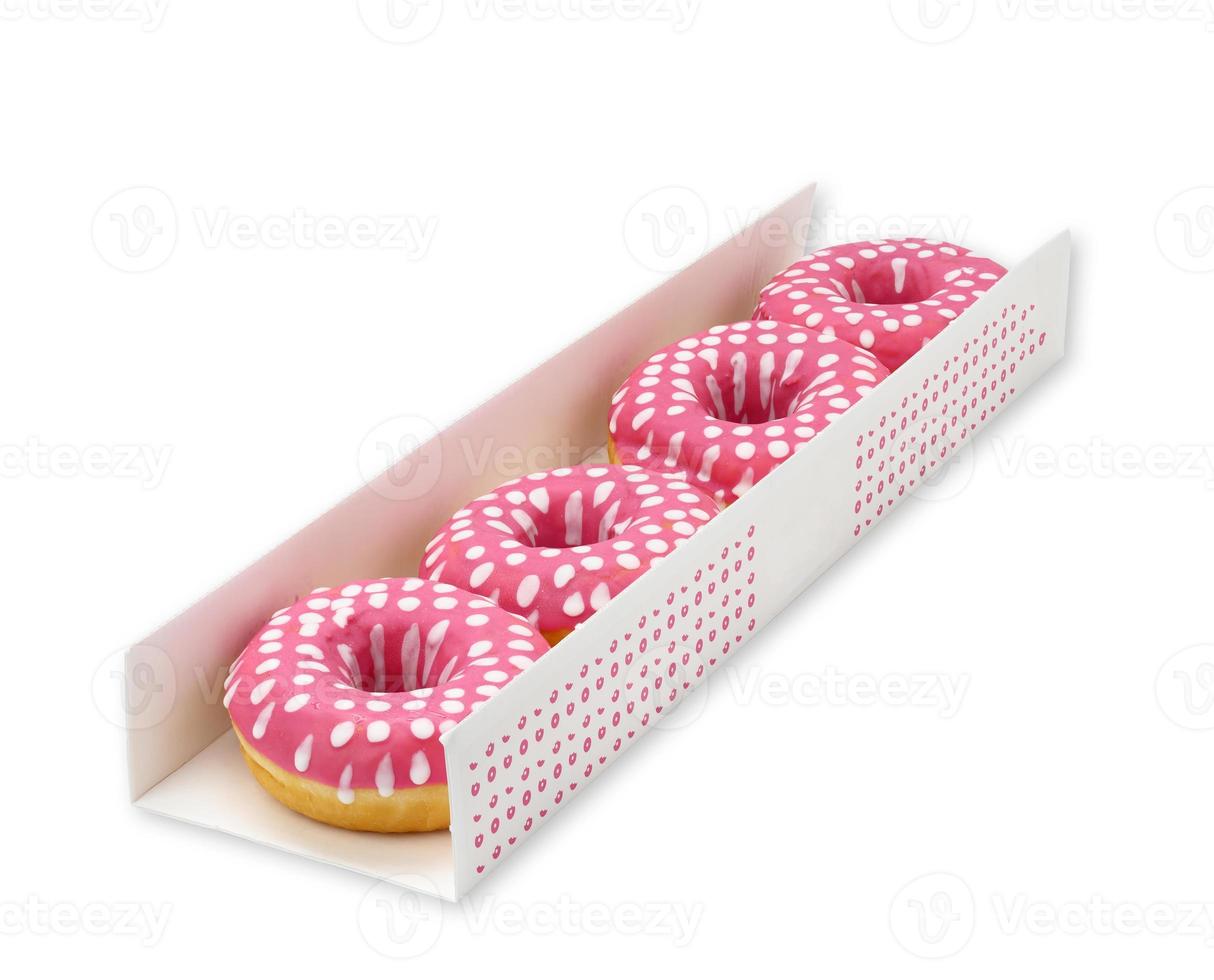 baked donuts with pink icing in white cardboard box isolated on white background photo