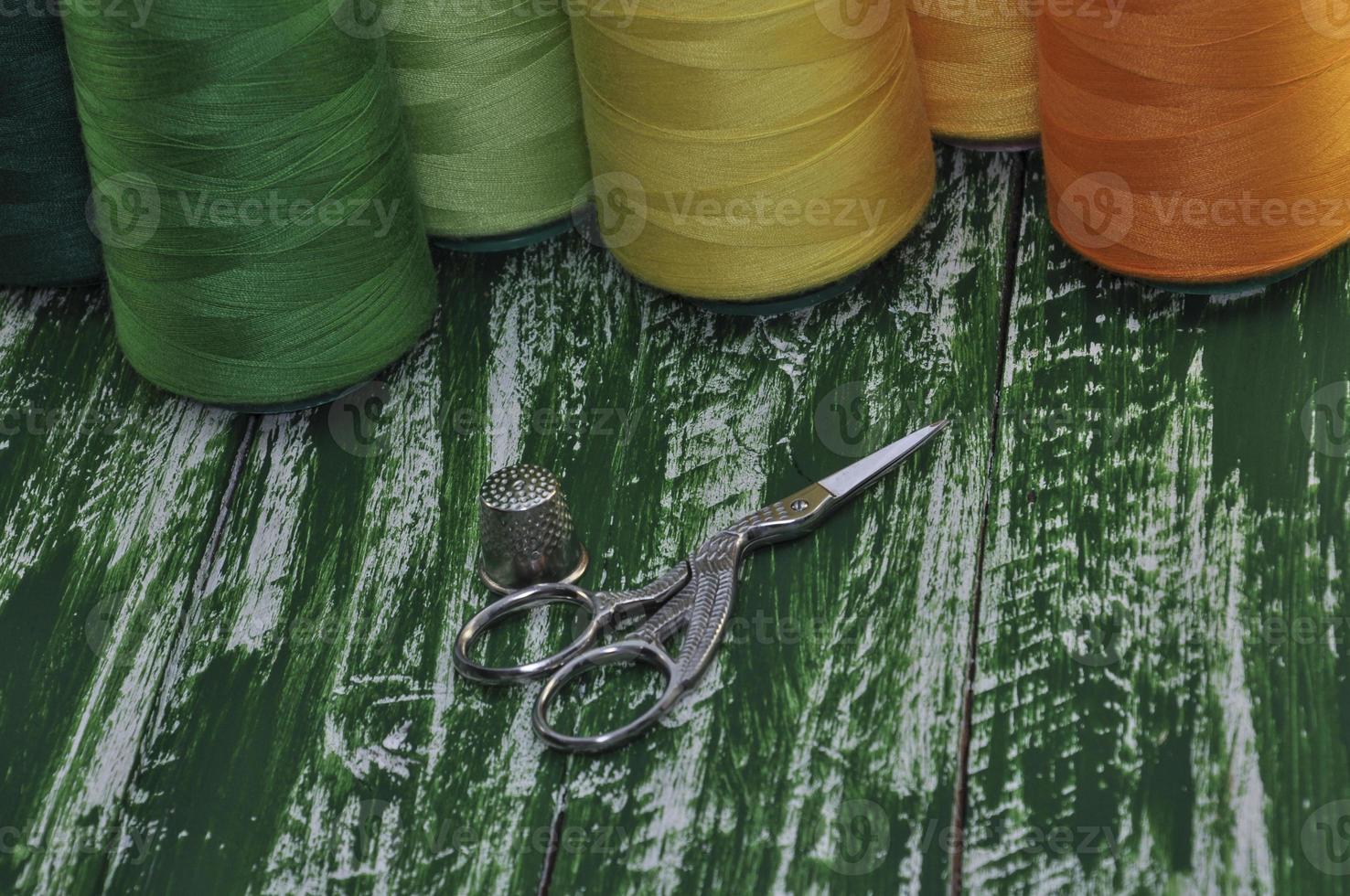 Macro photo of scissors on a background thread
