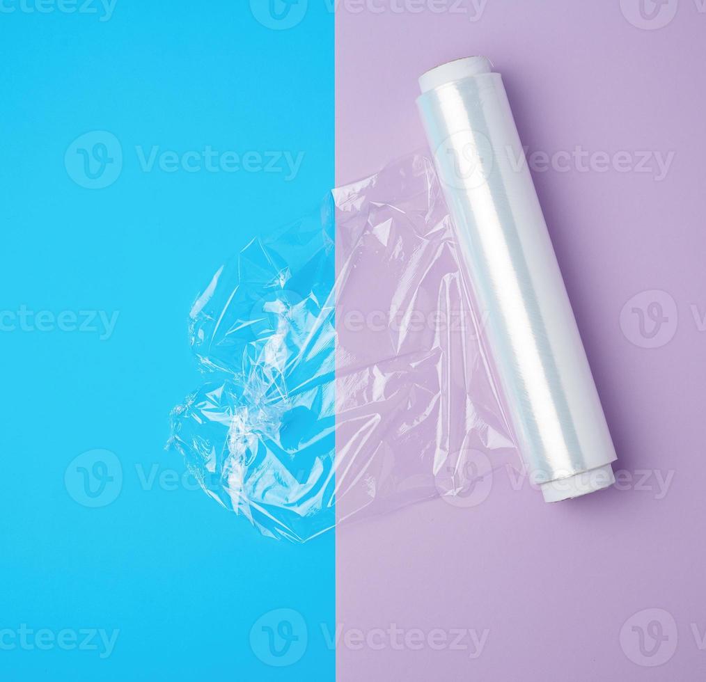 roll with transparent white polyethylene for wrapping products and packaging goods photo