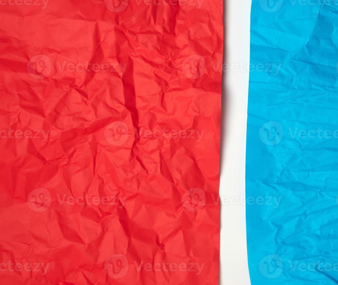 crumpled red and blue on paper on a white background photo