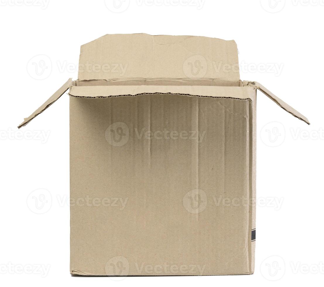 Brown blank corrugated cardboard box isolated on white background photo