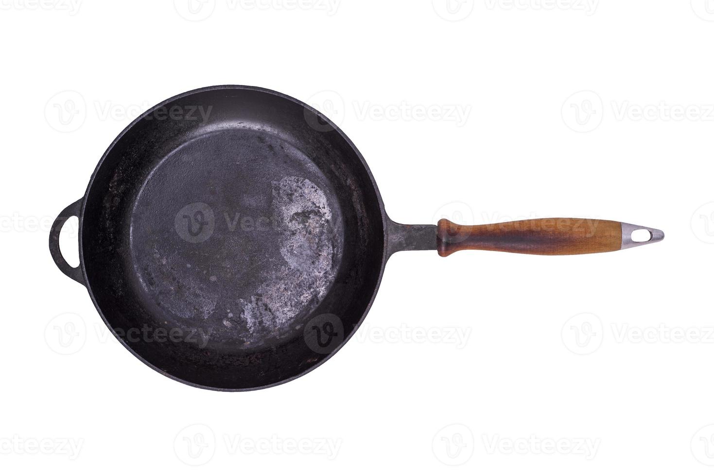 old black round cast-iron frying pa photo