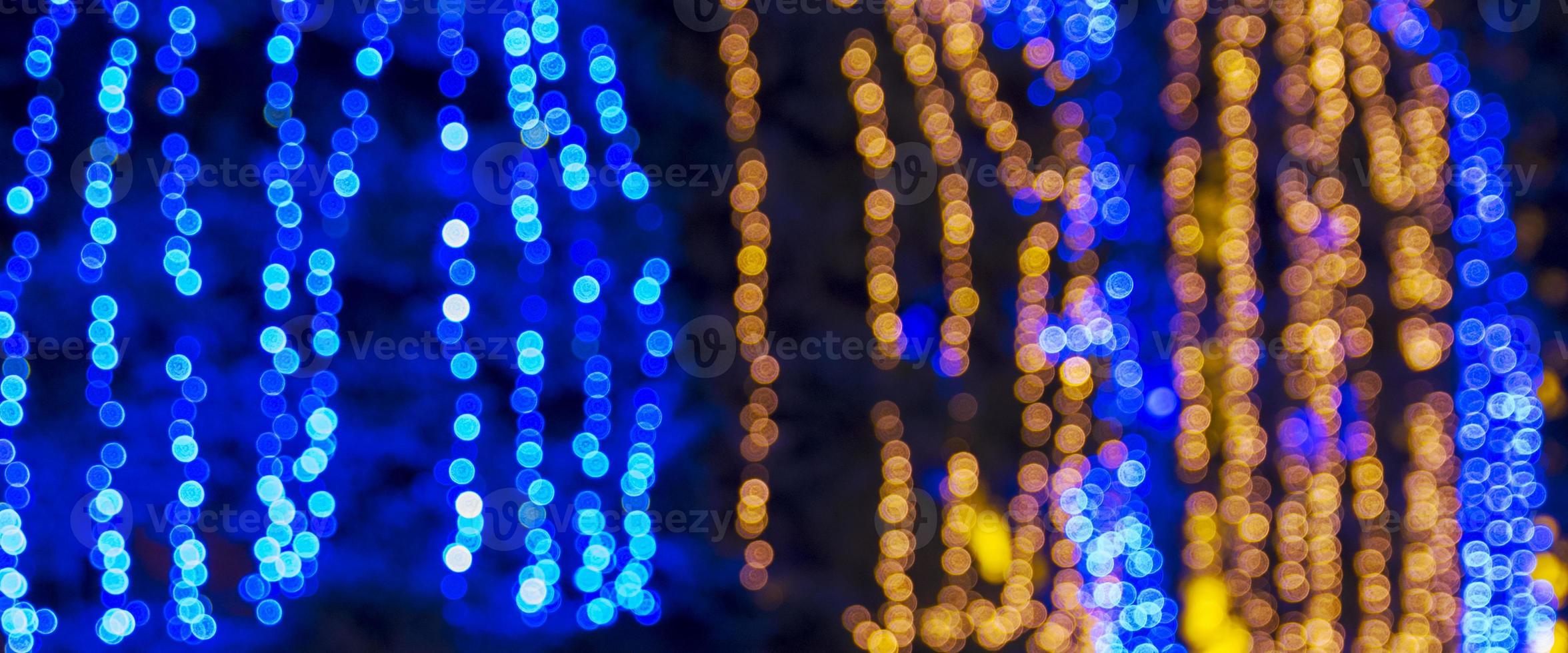 abstract blurred background with round blue and yellow bokeh photo