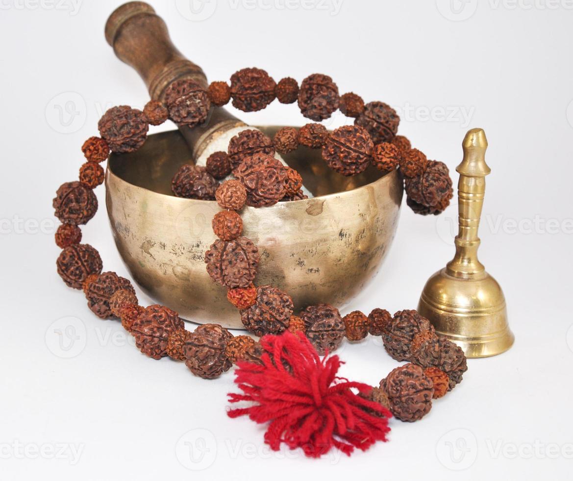 Tibetan Singing Bowl with beads and bells photo