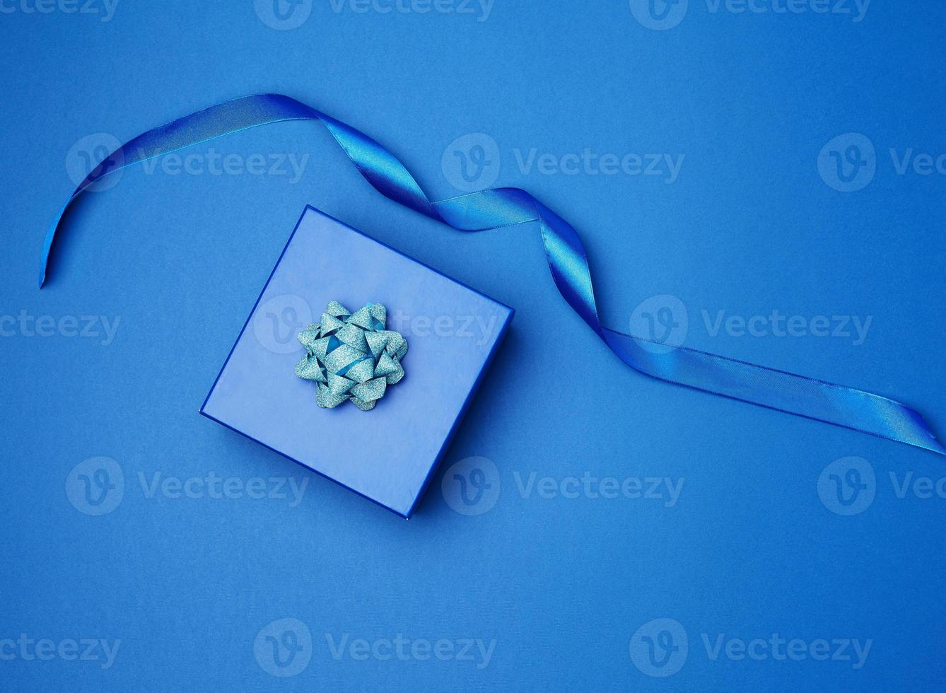 cardboard gift square box, bows, ribbons for packaging photo