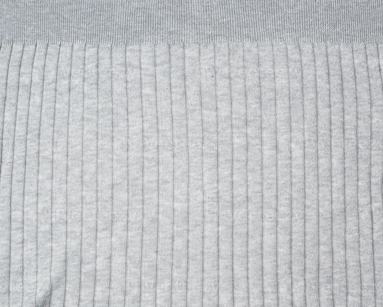fragment of gray knitted fabric, full frame, fabric for sweaters photo