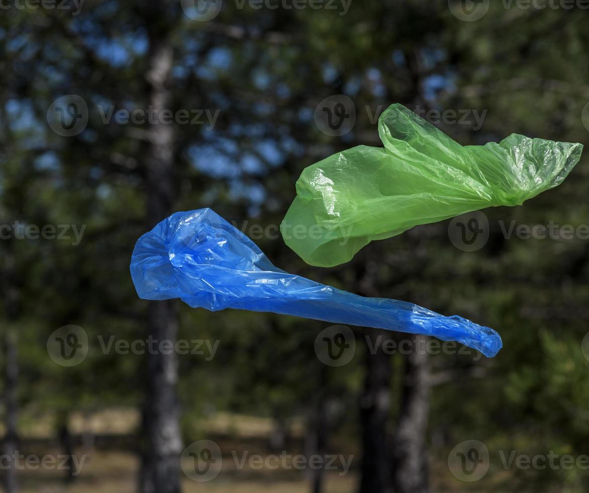 Two polyethylene bags for garbage fly in the air photo
