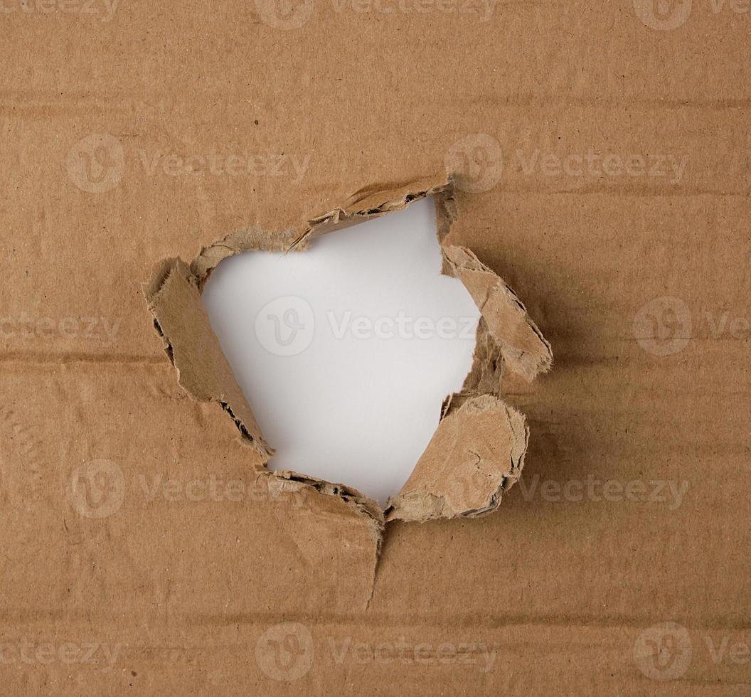 brown sheet of paper with a hole, full frame photo