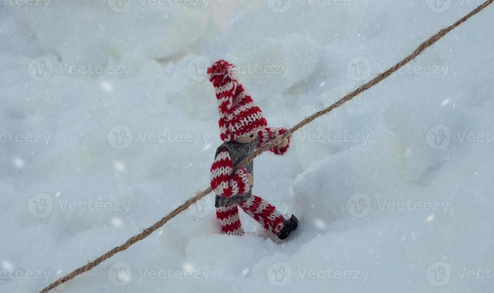 toy  holding on to a rope photo