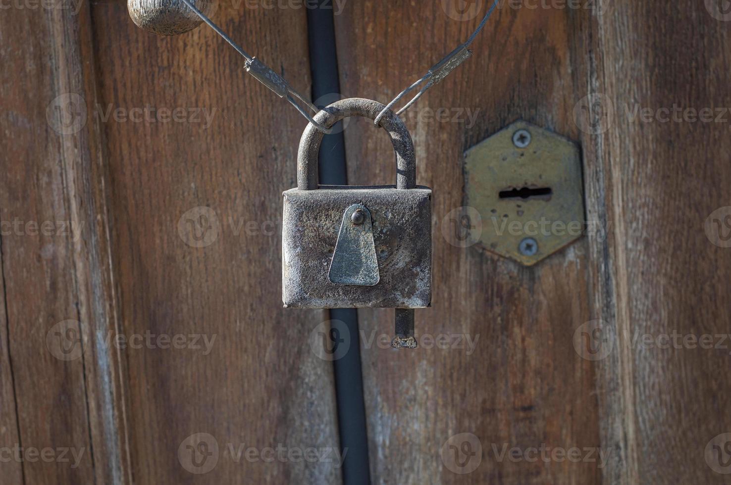 Old rusty closed lock photo