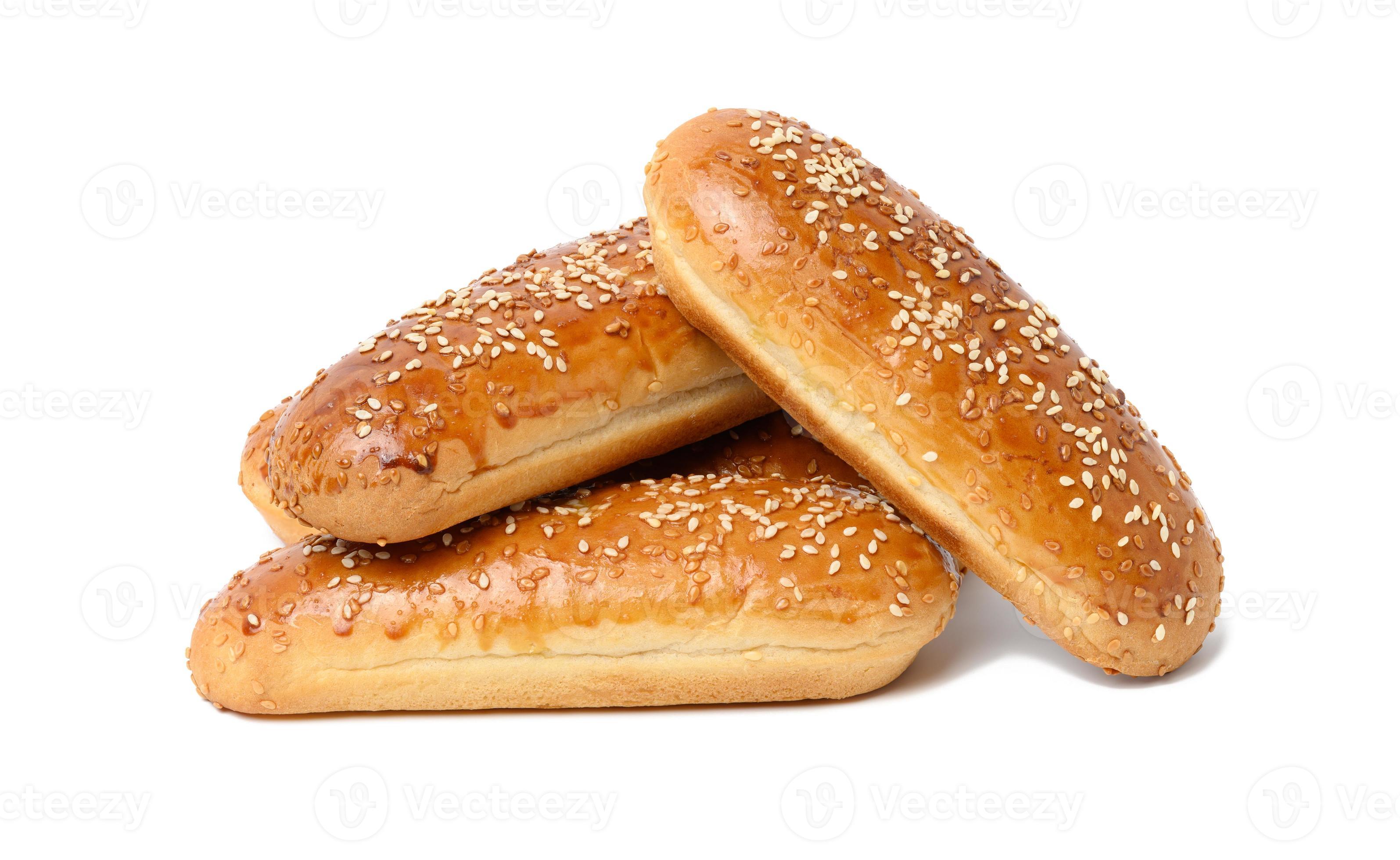 baked oblong sesame hot dog bun isolated on white background 18956102