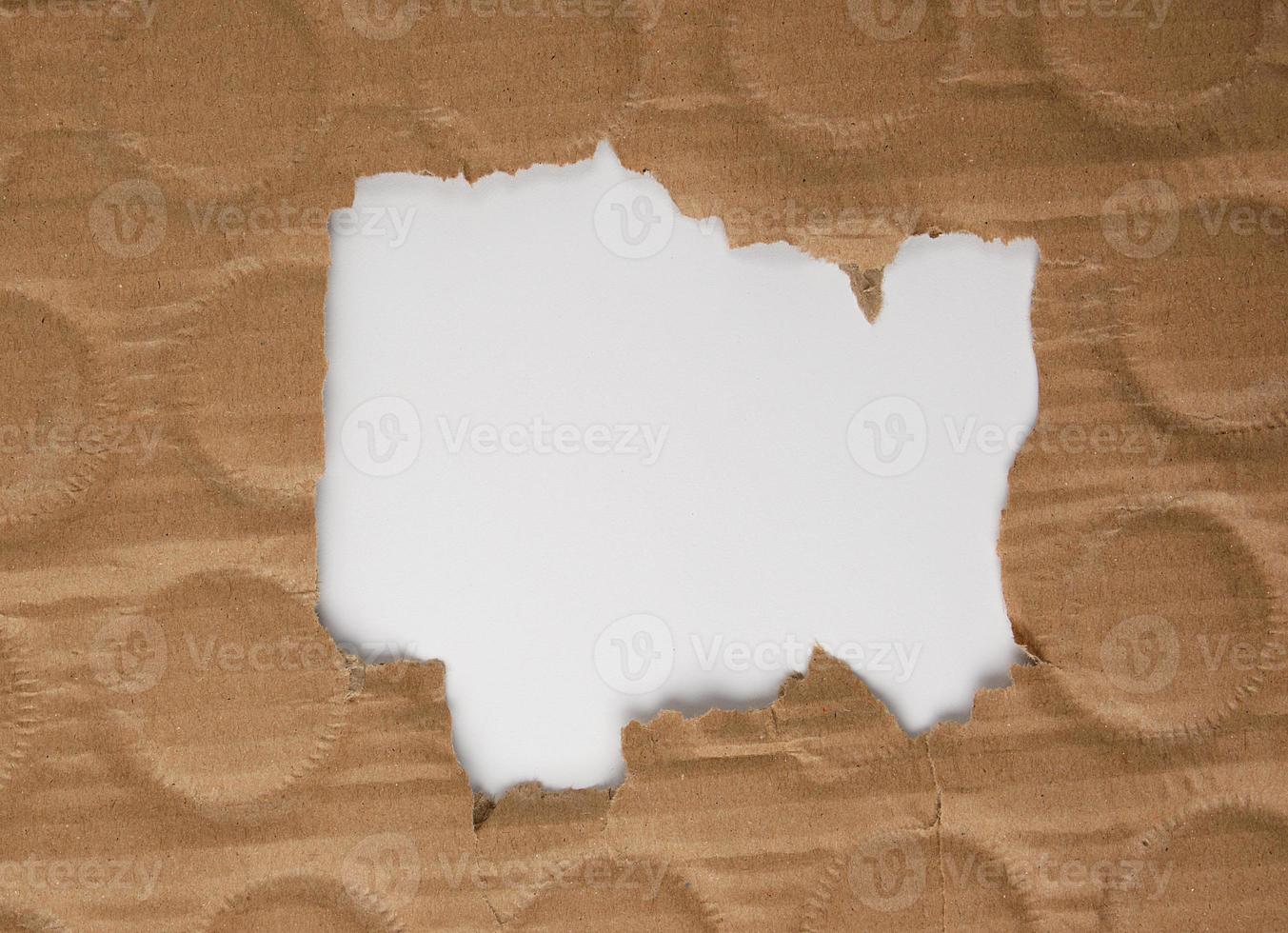 brown sheet of paper with a hole, full frame photo