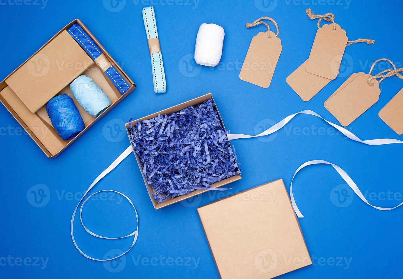 set for packing holiday gifts on a blue background photo