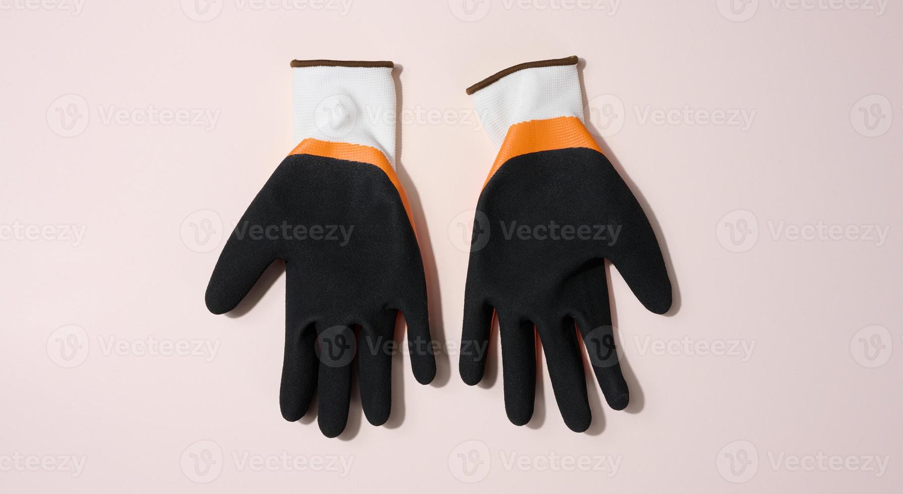 Knitted gloves with latex coating to protect against mechanical damage photo