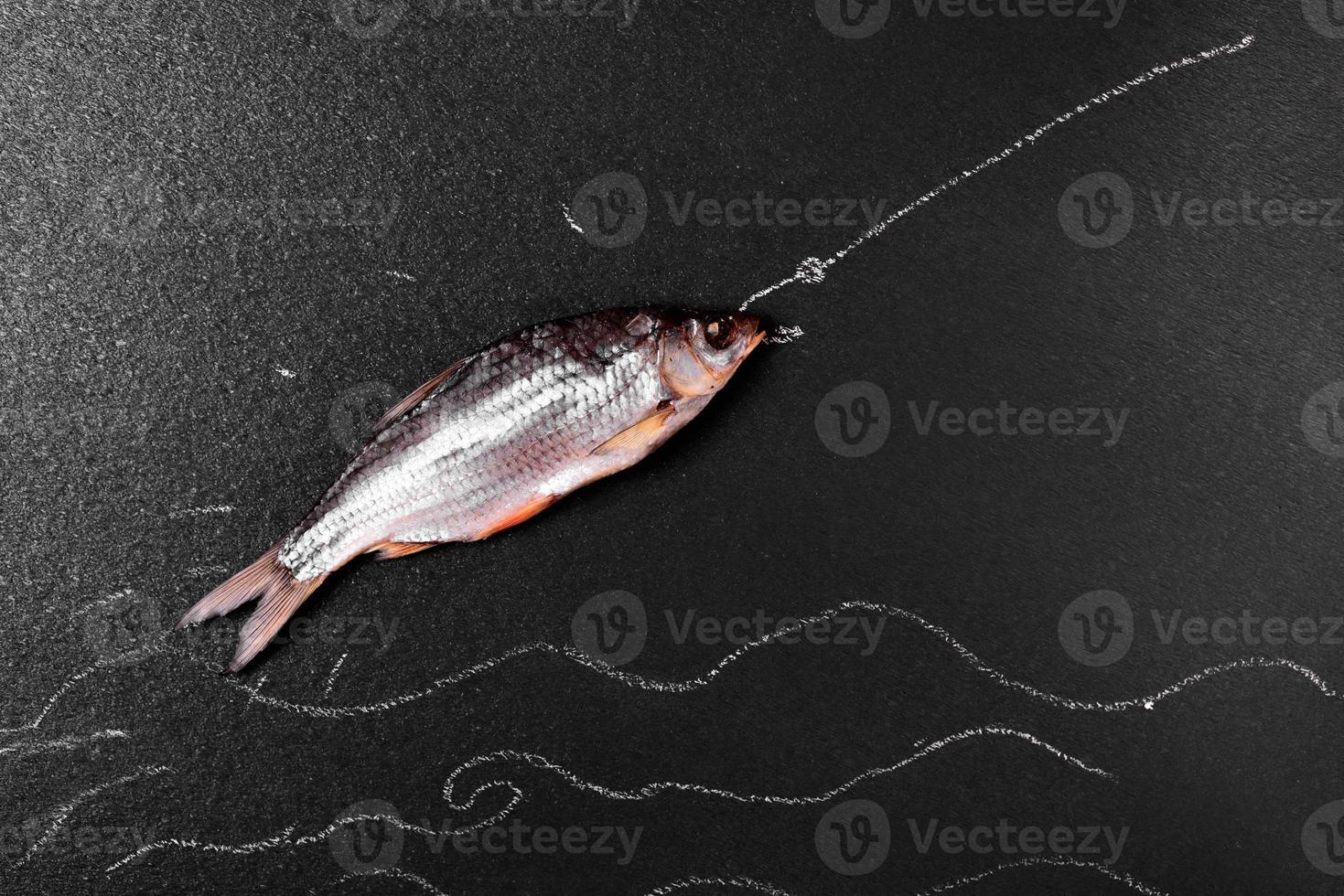 Fish ram on a black surface photo