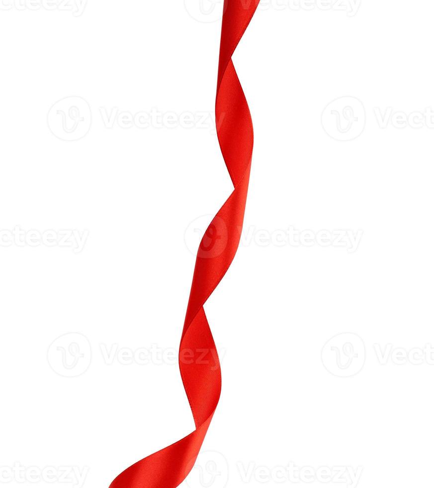 curled red satin ribbon isolated on white background photo