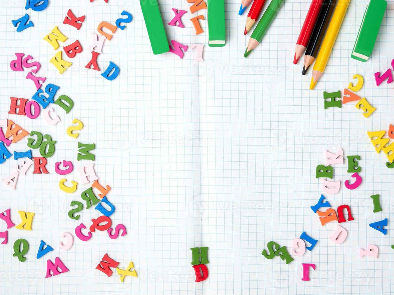 blank white sheet of squared papers and school supplies, back to school photo