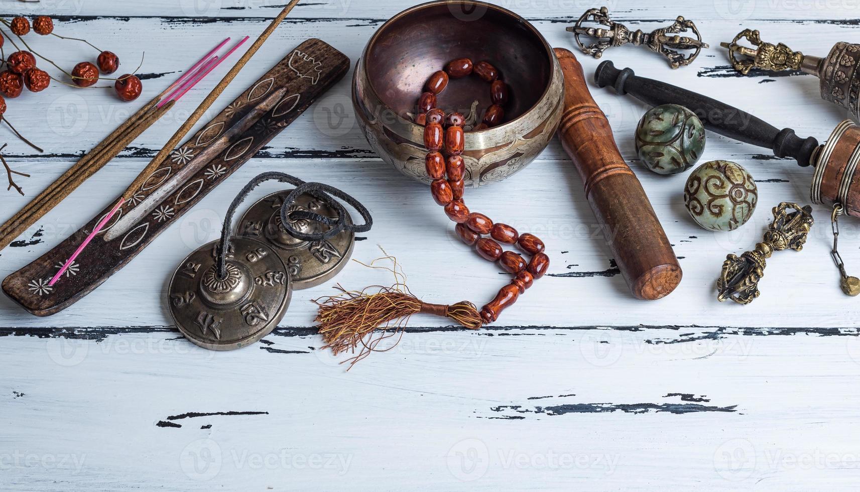 Tibetan religious objects for meditation and alternative medicine photo