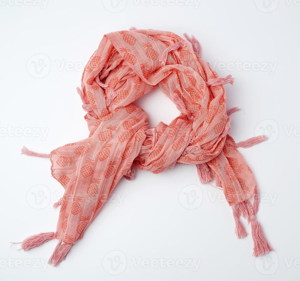 pink female scarf imitates tying around the neck on a white background photo