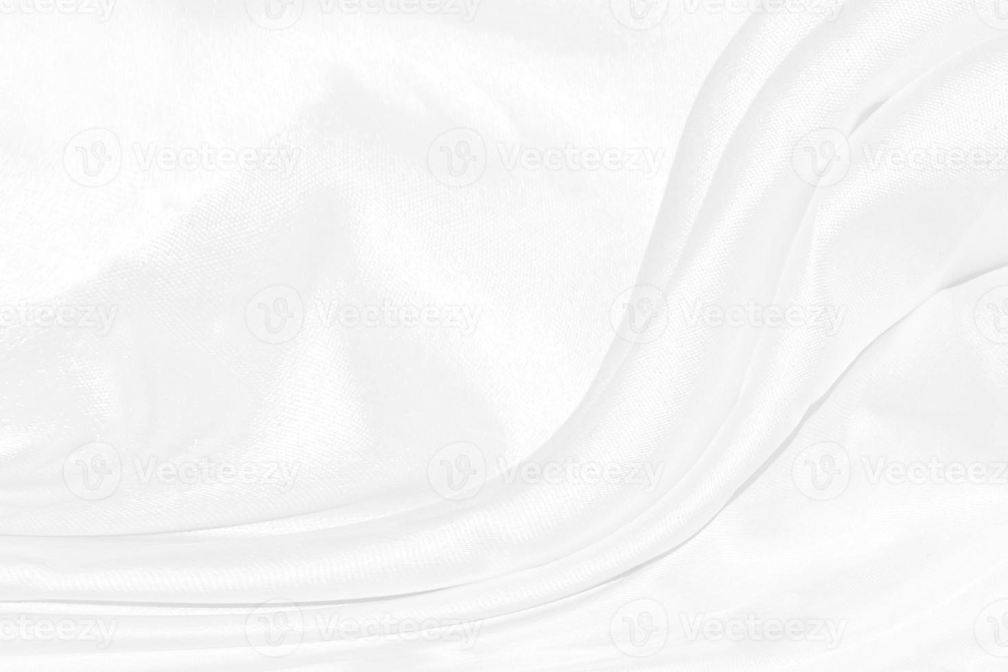 Texture, background, pattern. White cloth background abstract with soft waves, great for dresses or suits, where transparency and flow are required photo