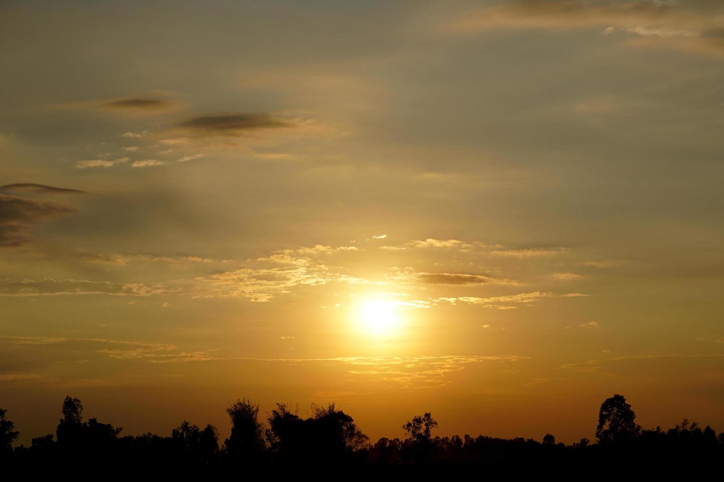 background of the setting sun in the evening photo