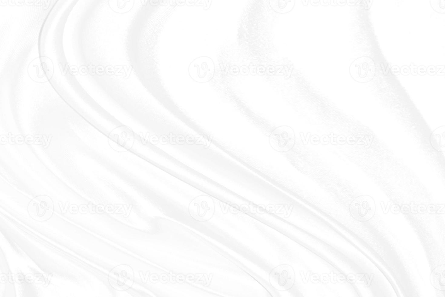 Smooth elegant white silk or satin luxury cloth texture can use as wedding background. Luxurious background design photo