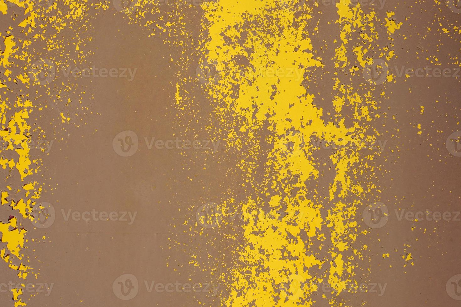 Yellow steel plate, rough surface, peeling paint, showing rusty steel texture. abstract background. photo