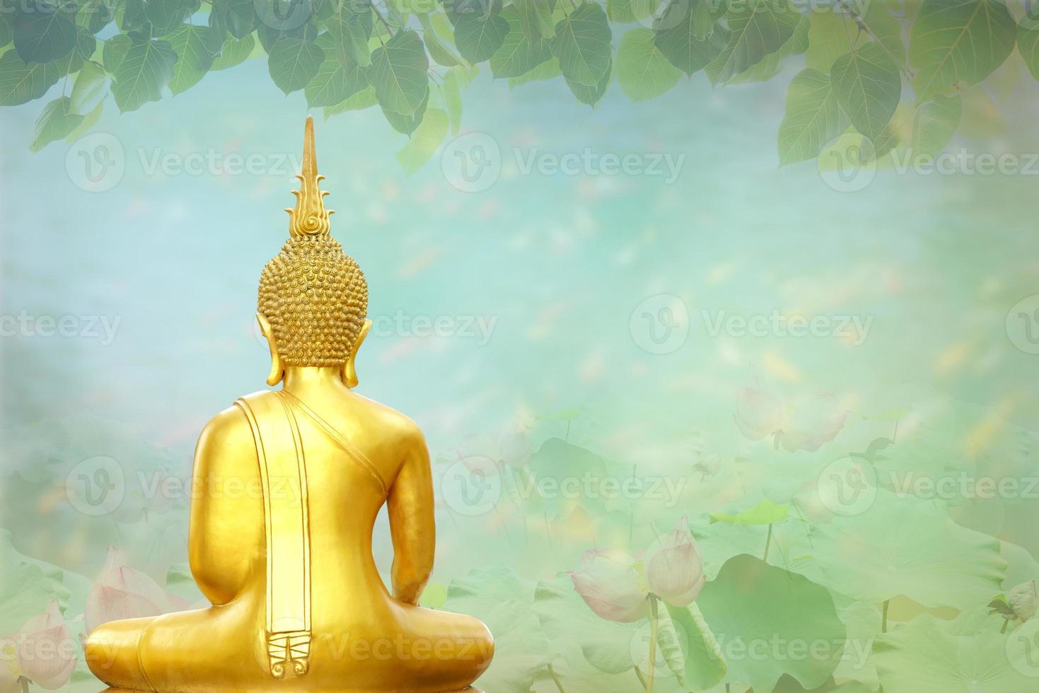 Makha Asanaha Visakha Bucha Day Golden Buddha image. Background of Bodhi leaves with shining light. Soft image and smooth focus style photo