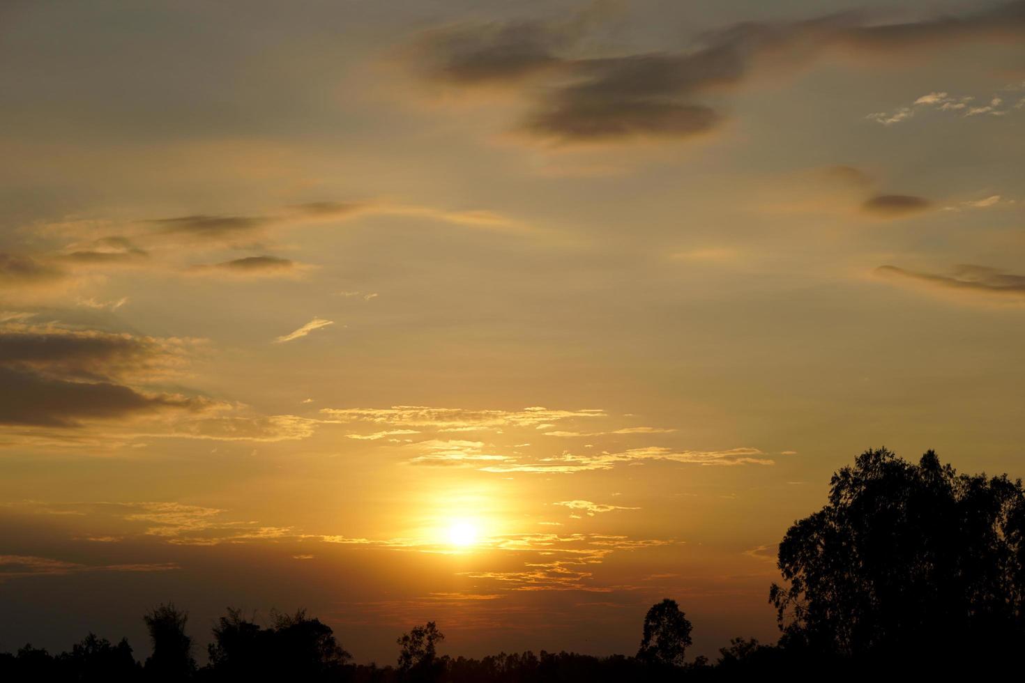 background of the setting sun in the evening photo