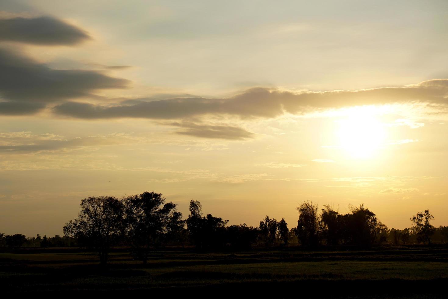 background of the setting sun in the evening photo