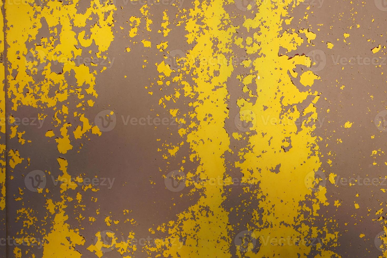 Yellow steel plate, rough surface, peeling paint, showing rusty steel texture. abstract background. photo