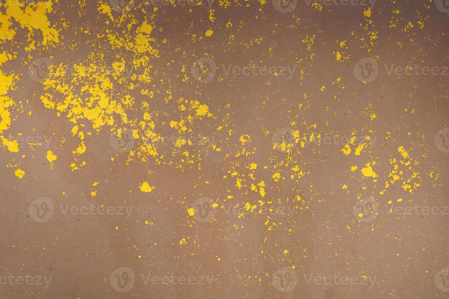 Yellow steel plate, rough surface, peeling paint, showing rusty steel texture. abstract background. photo