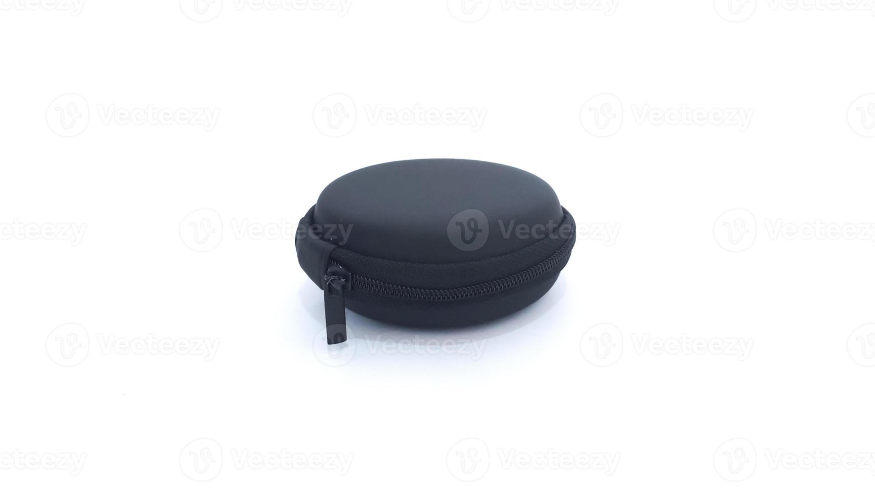 Black round pouch with a zipper isolated on white background photo