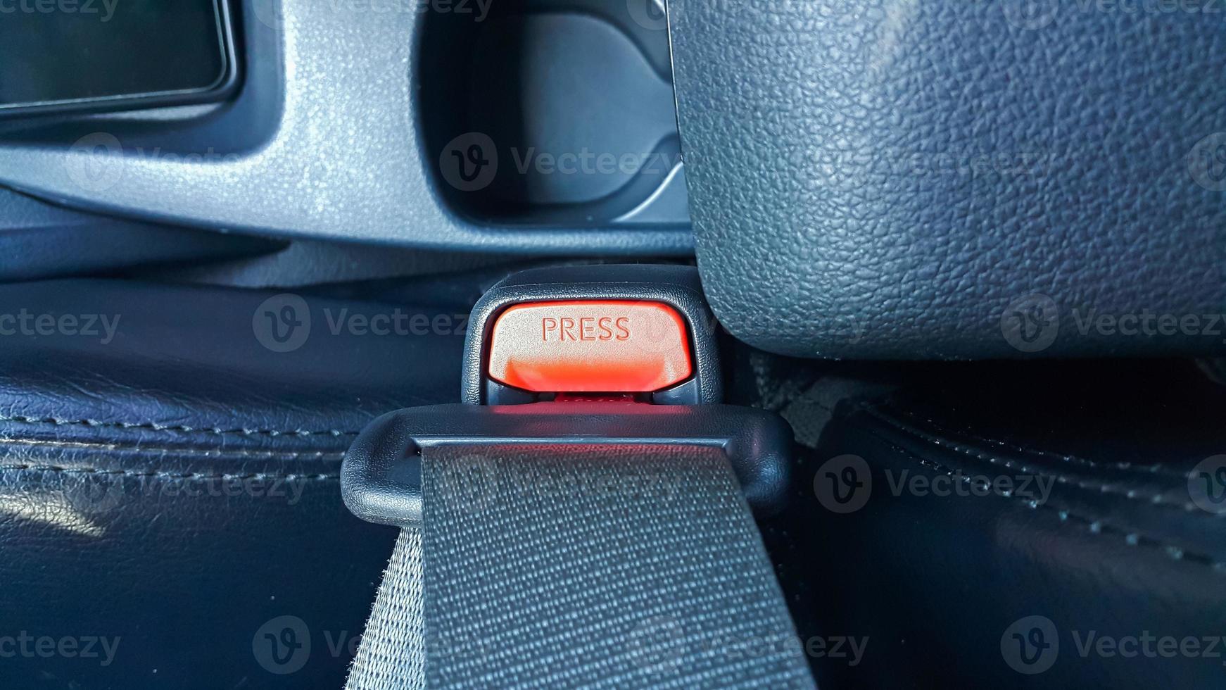 Close up of safety belt lock catch. Lock car seatbelt. photo