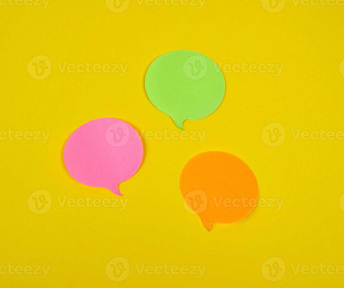 paper sticky cloud-shaped stickers on a yellow background photo
