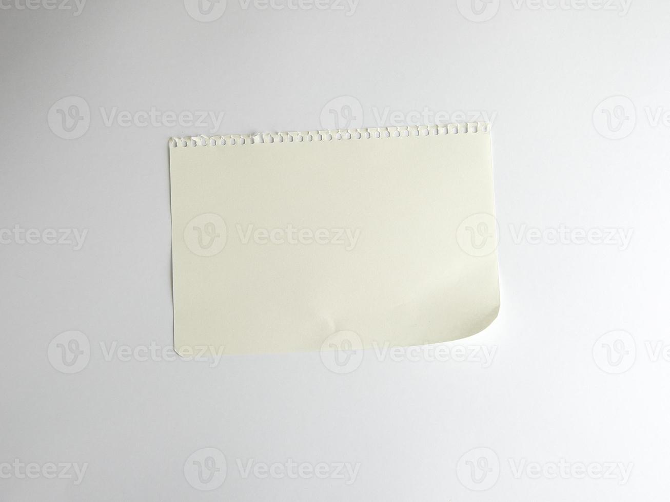 empty rectangular white sheet torn out of notepad photo